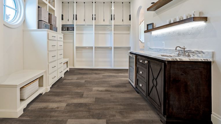 luxury vinyl plank (LVP) flooring in a laundry room Fleming Island, FL